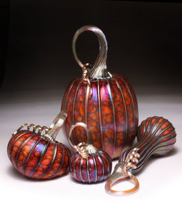 A set of Jack Pine Studio Pumpkin Art Glass